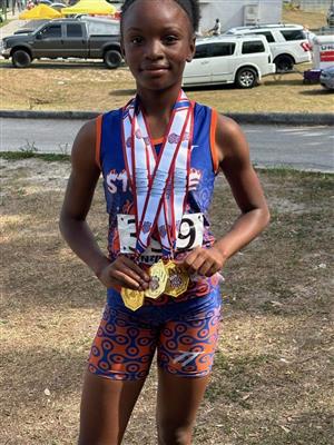 Student wearing medals 